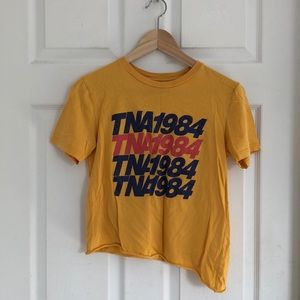 TNA asymmetrical crop tee